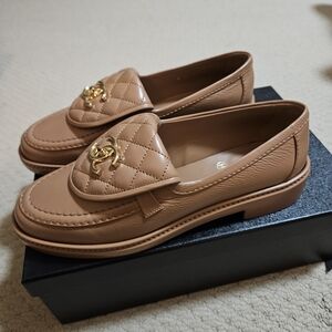 CHANEL Caramel Quilted Loafers with Gold Accent